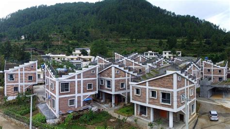 Rural Chinese Village Rebuilt With Eco-Friendly Homes And Rooftop Gardens