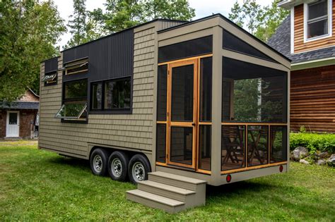 Veteran carpenter builds gorgeous tiny home with impressive wood working interior