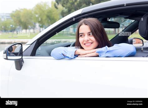 Business woman driving her new sports car Stock Photo - Alamy