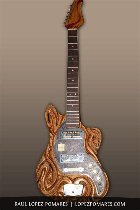 carved guitar, functional art | Raul Lopez Pomares | Old musical ...