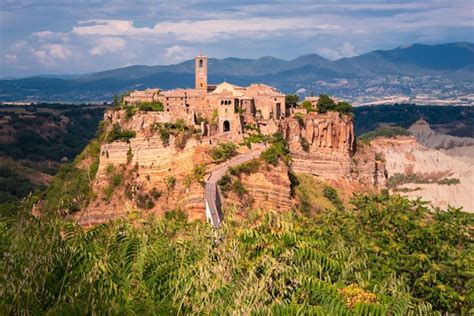 Premium Photo | Ancient town of bagnoregio italy old village on hill with a bridge