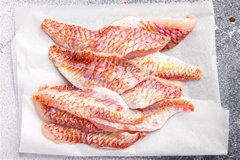 Premium Photo | Fish red mullet fillet fresh seafood tropical red ...