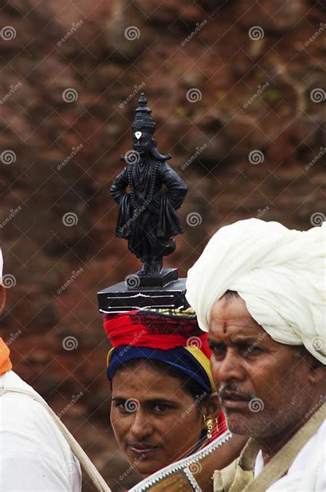 28 June 2019, Portrait of a Varkari Lady with Vitthala Idol. Dnyaneshwar Palkhi Pilgrimage - a ...