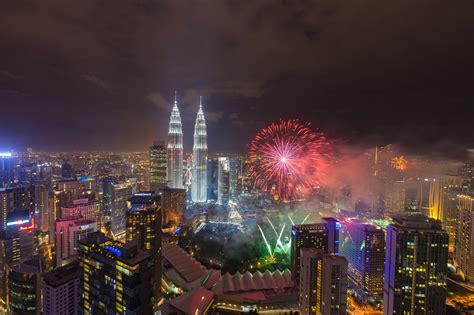 Kuala Lumpur city skyline during fireworks display on New Year ...