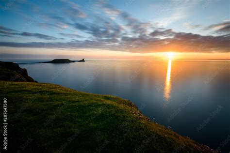 Sunset at Rhossili Bay - Rhossili Bay has been voted Wales' Best Beach ...