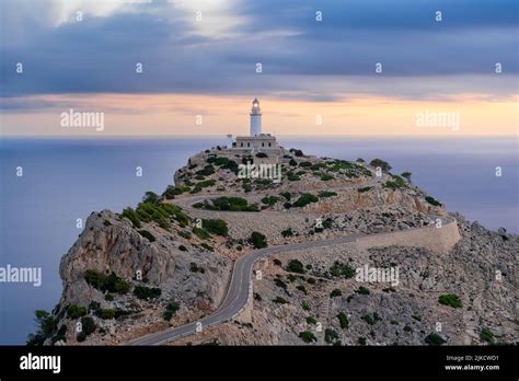 An aerial view of the Formentor Lighthouse on Cape Formentor cliff ...