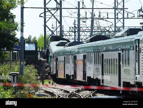 Train carriages are pictured at the scene where a train derailed in Carnate, Italy August 19 ...