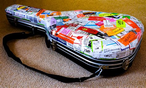 Guitar case decorated with airline stickers #guitar case, #airline stickers, #luggage decoration ...