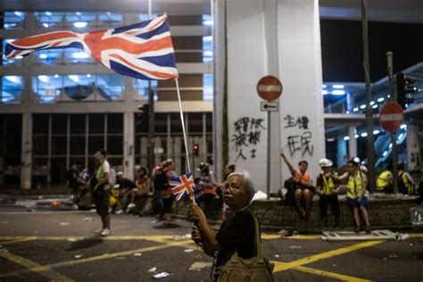 Hong Kong protests: Thugs wearing white beat protesters with poles in ...