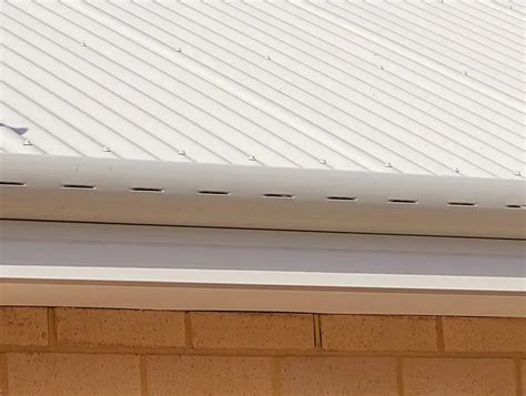 Slotted Gutters: What Are Gutter Overflow Slots And How Do They Work?