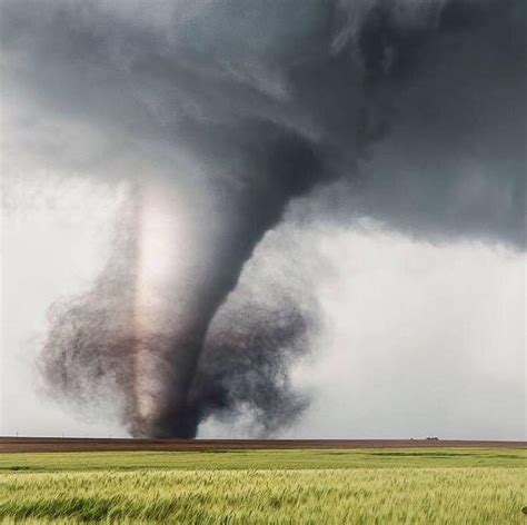 A Tornado from a supercell thunderstorm over a pristine farm by Brett ...