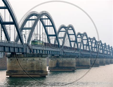 Image of Rajahmundry Arch Bridge On Godavari River With a Moving train-TL366695-Picxy