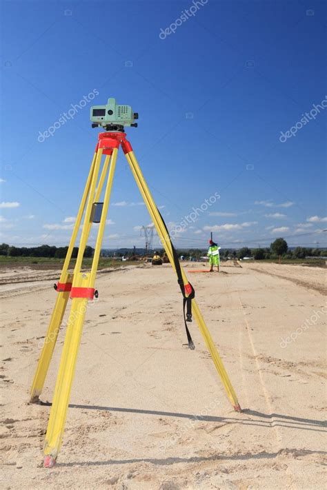 Geodesist taking measurement Stock Photo by ©LSaloni 9584044