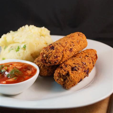 Spicy Veggie Sausages with Spring Onion Mash and Tangy Tomato and Onion ...