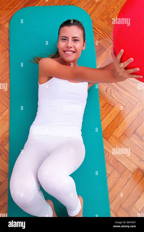 physiotherapy exercises with bobath ball fitball Stock Photo - Alamy