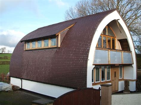 A curved roofing gallery of Dreadnought Tiles projects | Arched cabin ...