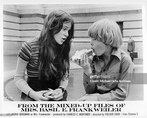 Sally Prager and Johnny Doran eating hotdogs together in a scene from... News Photo - Getty Images