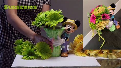 Flower arrangement on a Mickey Mouse Vase