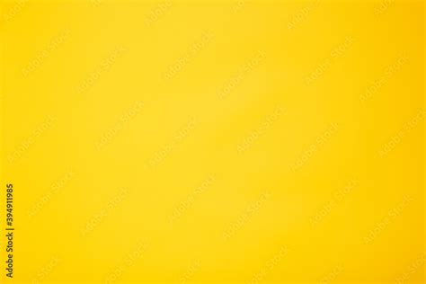 Bright yellow color empty background. Nobody. Clean sheet. Smooth tone. Texture of sunny plaster ...