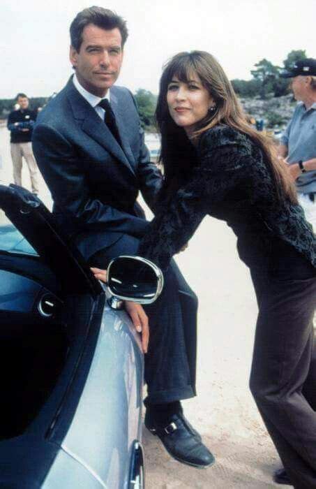 Pierce Brosnan and Sophie Marceau on set of The World is nit enough... | Sophie marceau james ...