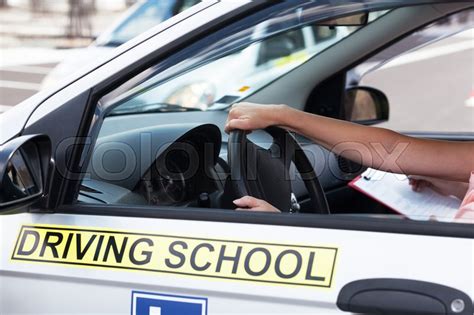 Student driver. Learning to drive a ... | Stock image | Colourbox