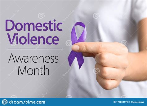 Woman Holding Purple Ribbon on Background, Closeup. Symbol of Domestic Violence Awareness Stock ...