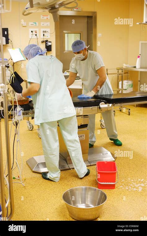 Hospital cleaning staff disinfecting operating room Stock Photo, Royalty Free Image: 72426108 ...