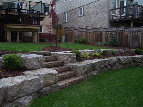 Pin by Bromar Landscaping on Natural stone features | Backyard ...