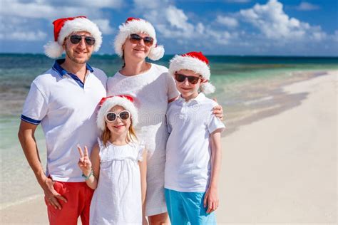 Family at Beach on Christmas Stock Photo - Image of coast, happiness: 78225934