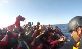 Refugee children saved from lifeboat near Libya caught on video | Metro News