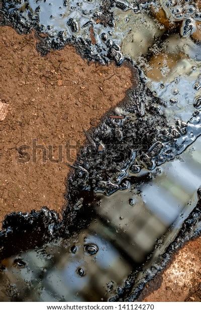 Oil contaminating the soil on the ground