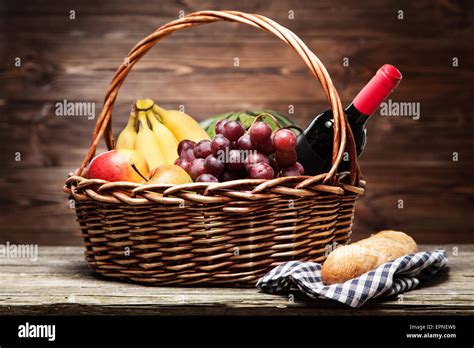 Basket full of fresh fruit Stock Photo - Alamy