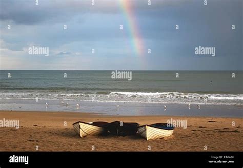 Rainbow Boats sea Stock Photo - Alamy