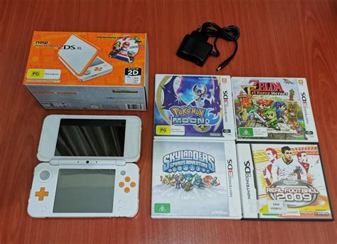 Nintendo 2ds xl + Games, Video Gaming, Video Games on Carousell