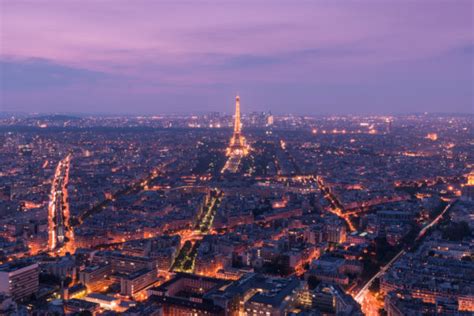 Eiffel Tower: Paris Decides To Switch Lights Out Early - Travel