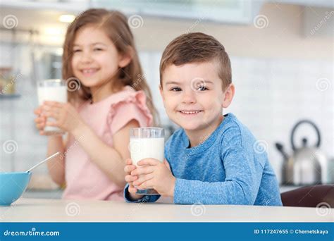 Cute Little Kids Drinking Milk Stock Image - Image of glasses ...