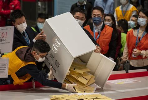 Pro-Beijing candidates sweep victories at Hong Kong polls amid record ...