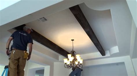 How to Install Faux Wood Ceiling Beams - YouTube