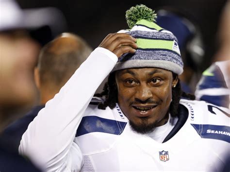 Marshawn Lynch works out with Skittles in new commercial (Video)