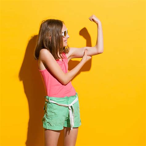 Girl Flexing Stock Photos, Pictures & Royalty-Free Images - iStock