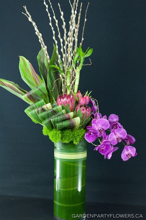 Modern Chinese New Year $125 | Flower arrangements simple, Large floral arrangements, Tropical ...