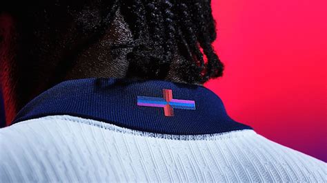 Nike sparks controversy with ‘playful update’ to England’s cross of St. George | CNN