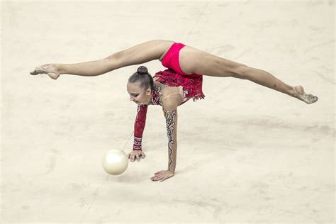 Here Are 8 Bizarre Yet Beautiful Photos of Women's Rhythmic Gymnastics ...