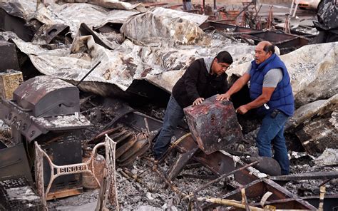 Woolsey Fire: Woman drives through flames while fleeing wildfire in ...