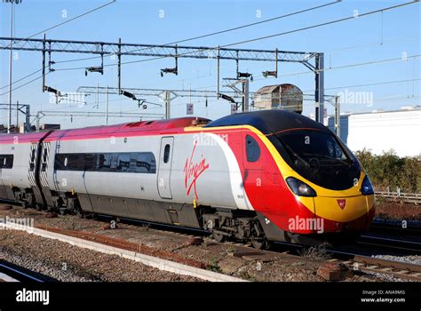 Virgin Pendolino train at Rugby, Warwickshire, England, UK Stock Photo ...