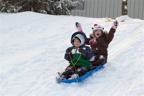 Children Kids Sledding Toboggan Sled Snow Winter Stock Image - Image: 39408165