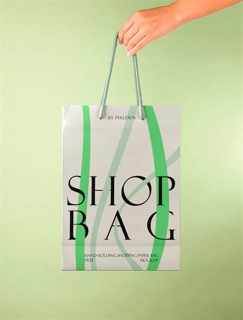 Hand Holding Paper Bag Free Mockup — Free Mockup World