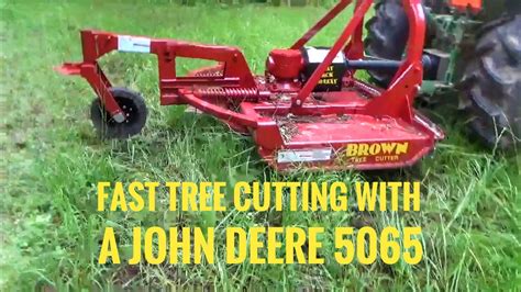 New Brown tree cutter in action on a John Deere tractor! - YouTube