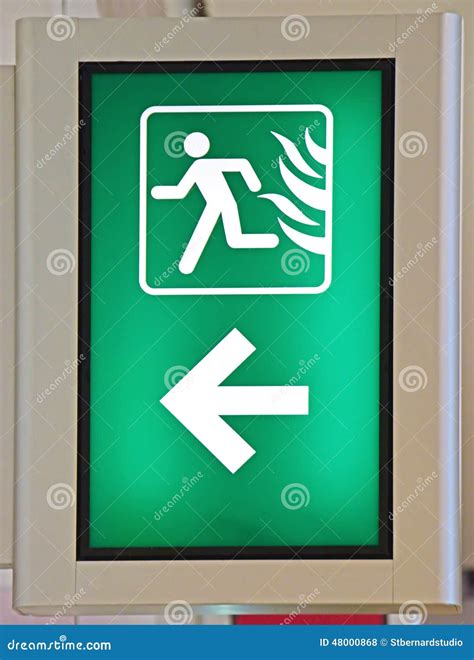 Emergency Fire Exit Sign in Green Color Stock Photo - Image of duration, building: 48000868