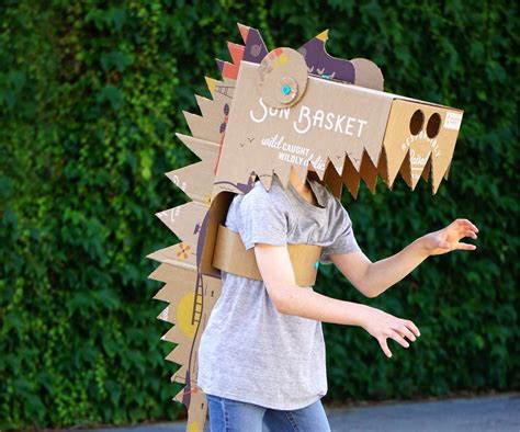 Makedo Dinosaur Costume From a Sun Basket Box | Cardboard costume ...